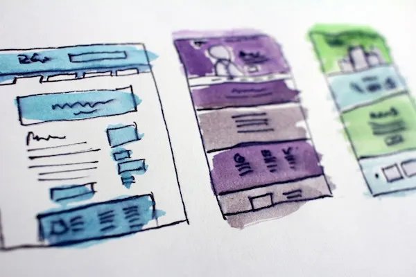 Watercolor sketches of three website and mobile page layouts in blue, purple and green