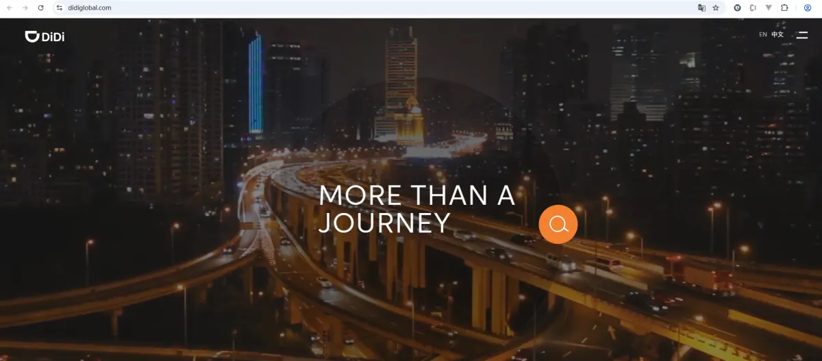 DiDi global website home page with the slogan “More than a journey” over a night view of Shanghai’s elevated roads