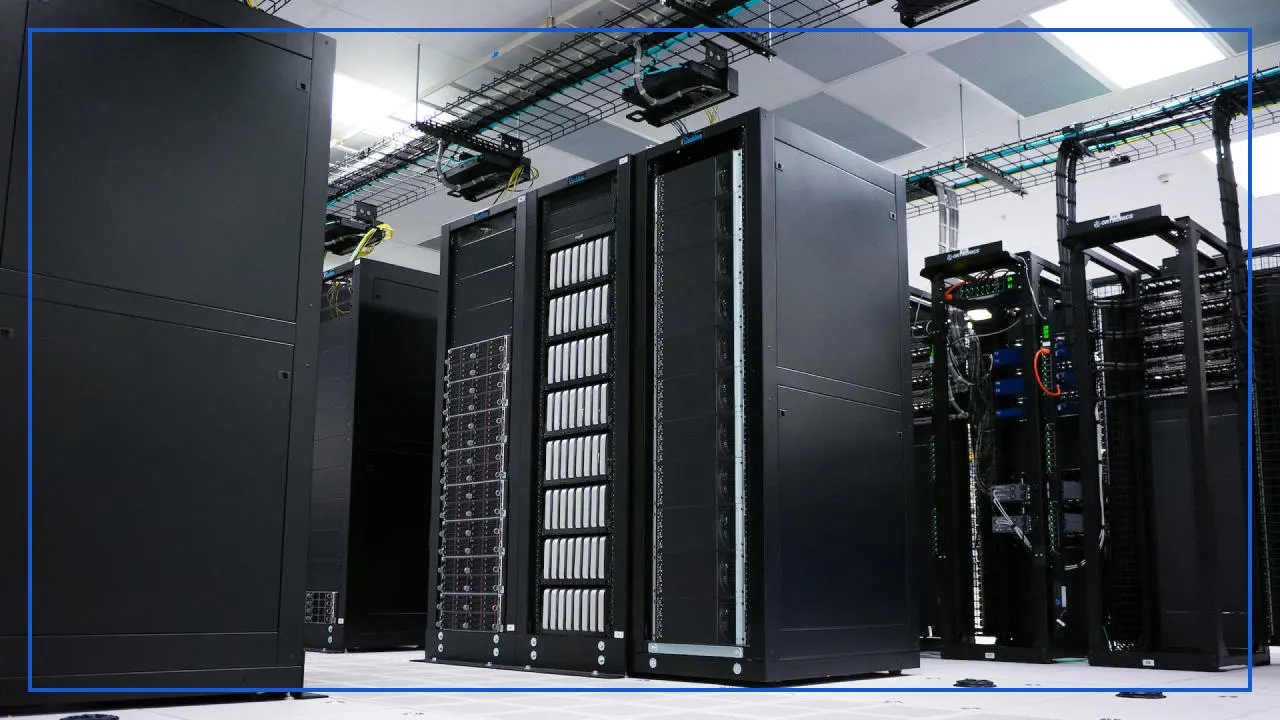 Rows of black server racks with cabling trays in a data center
